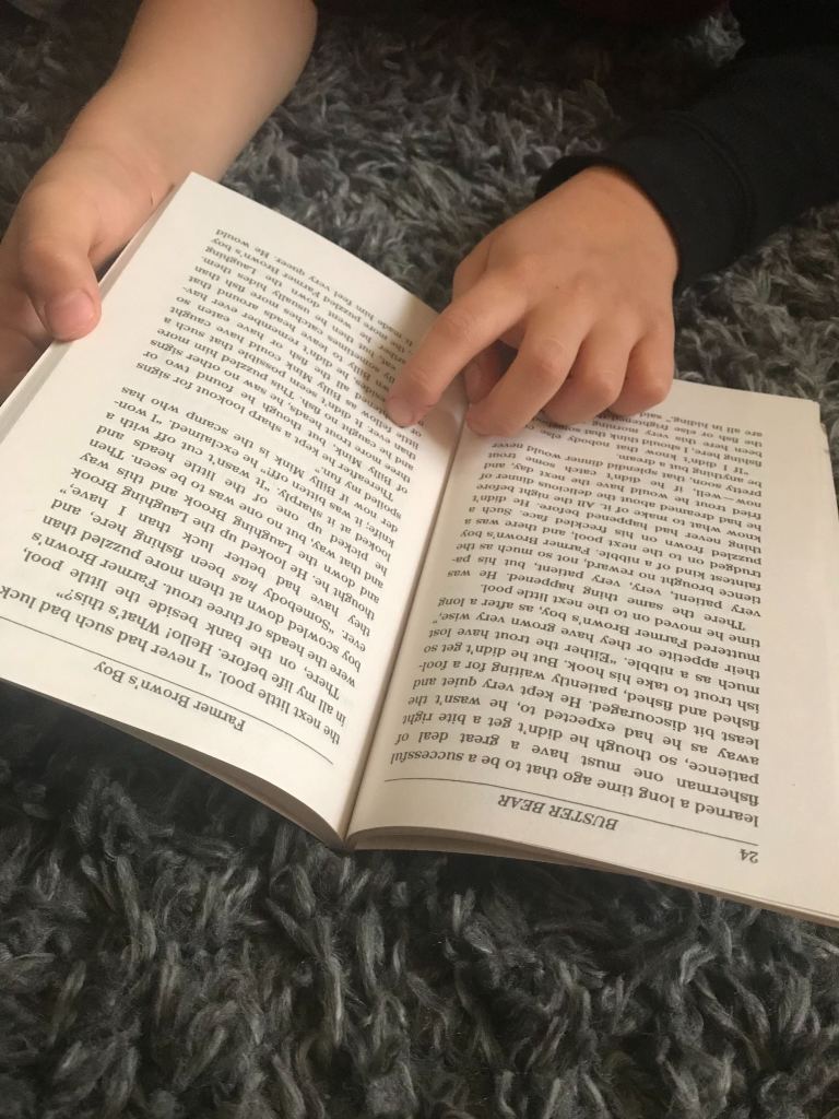 here's my son taking my advice #1 to read something instead of streaming Disney+. I'm very good at making them do things I'm not very good at.